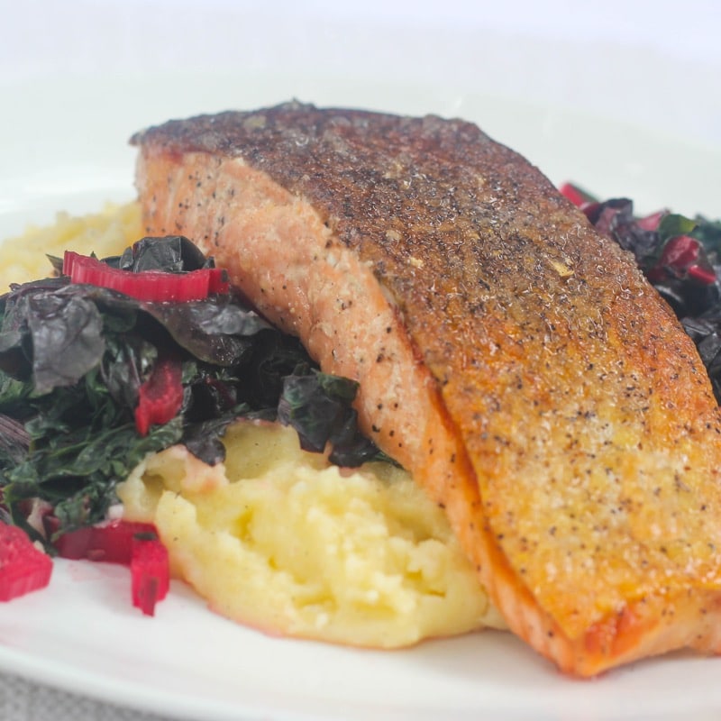Seared salmon w/ rainbow Swiss chard & creamy polenta