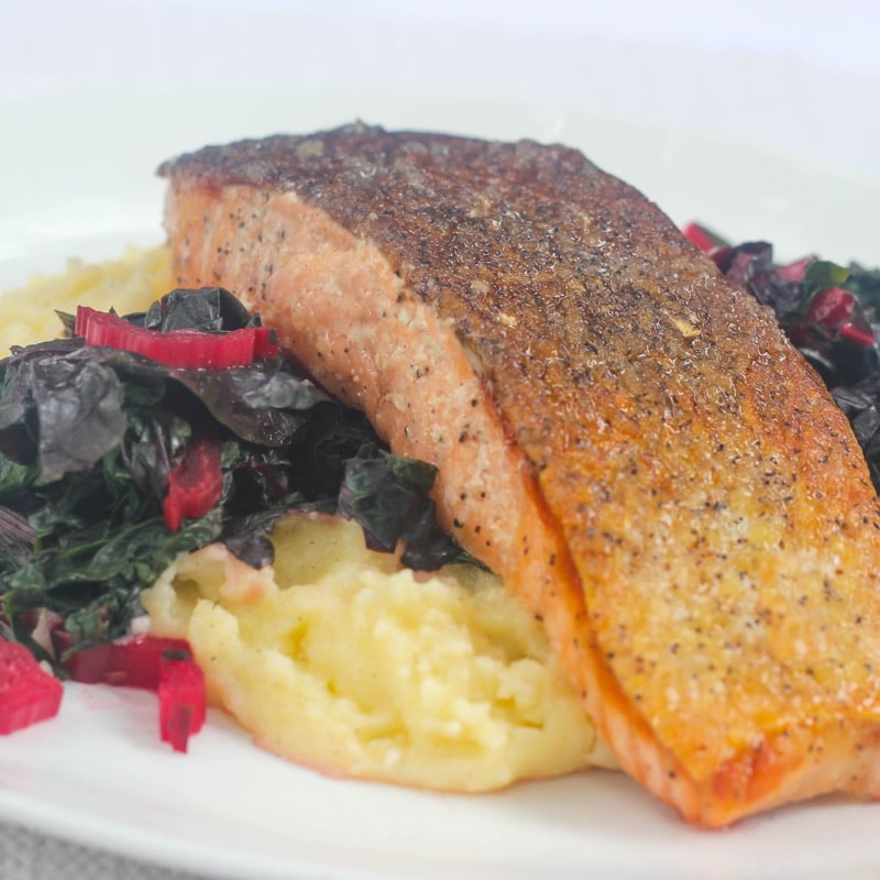 Pan seared salmon w/ rainbow swiss chard & creamy polenta