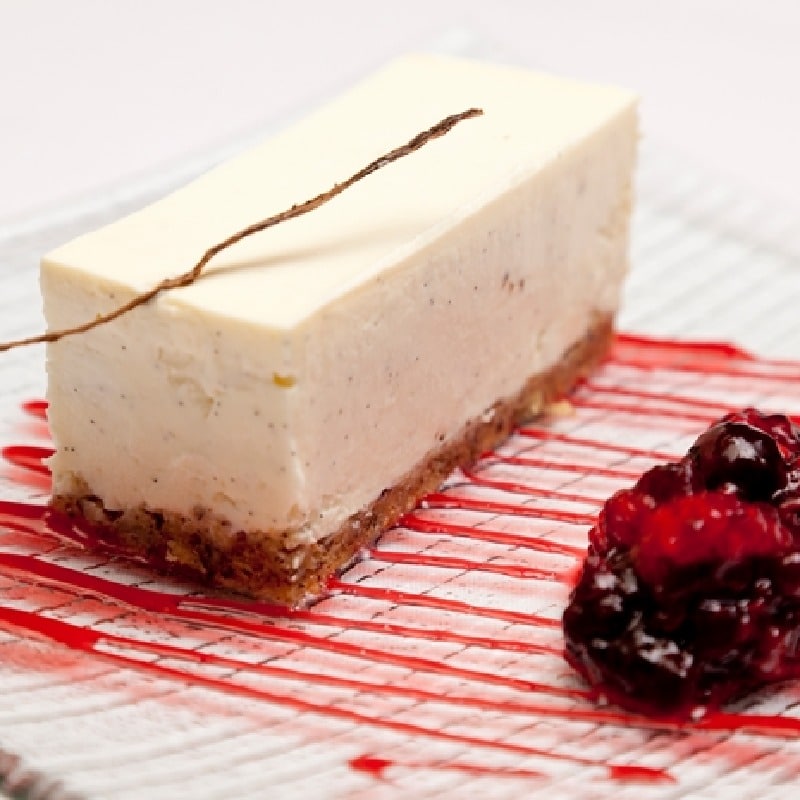 Vanilla cheesecake with red berry compote