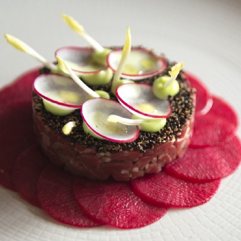 Tartare of dry aged beef prime fillet, pickled radish, wasabi, quinoa