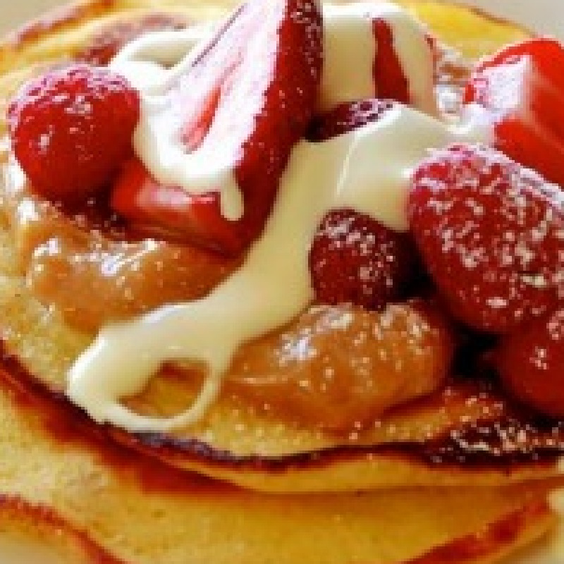 Dulche de leche cornmeal pancake with fresh whipped cream